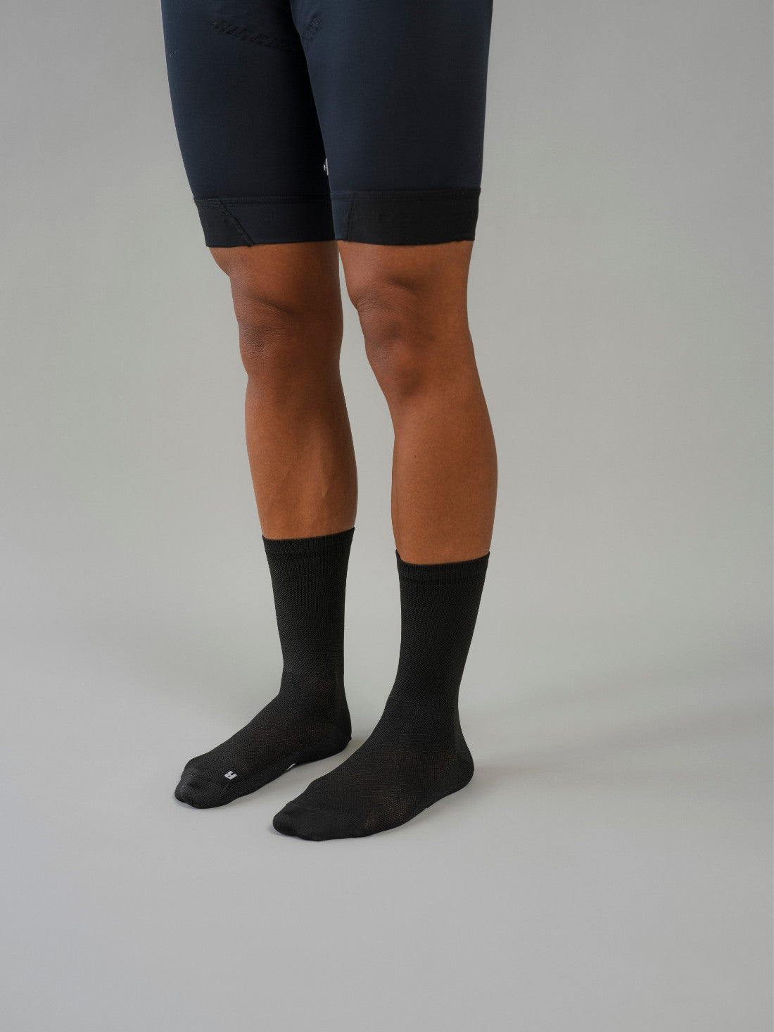 Premium unisex cycling socks, stylishly designed for men and women, made in Europe. Enhance performance and comfort on every ride.