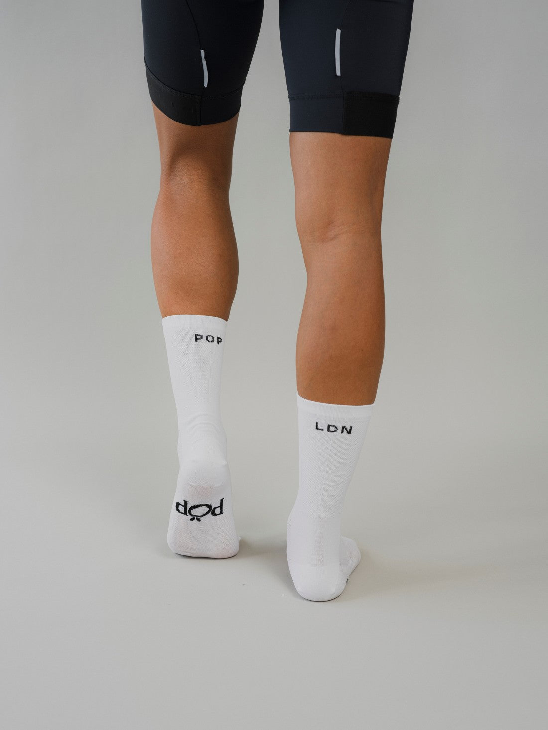 Premium unisex cycling socks, stylishly designed for men and women, made in Europe. Enhance performance and comfort on every ride.